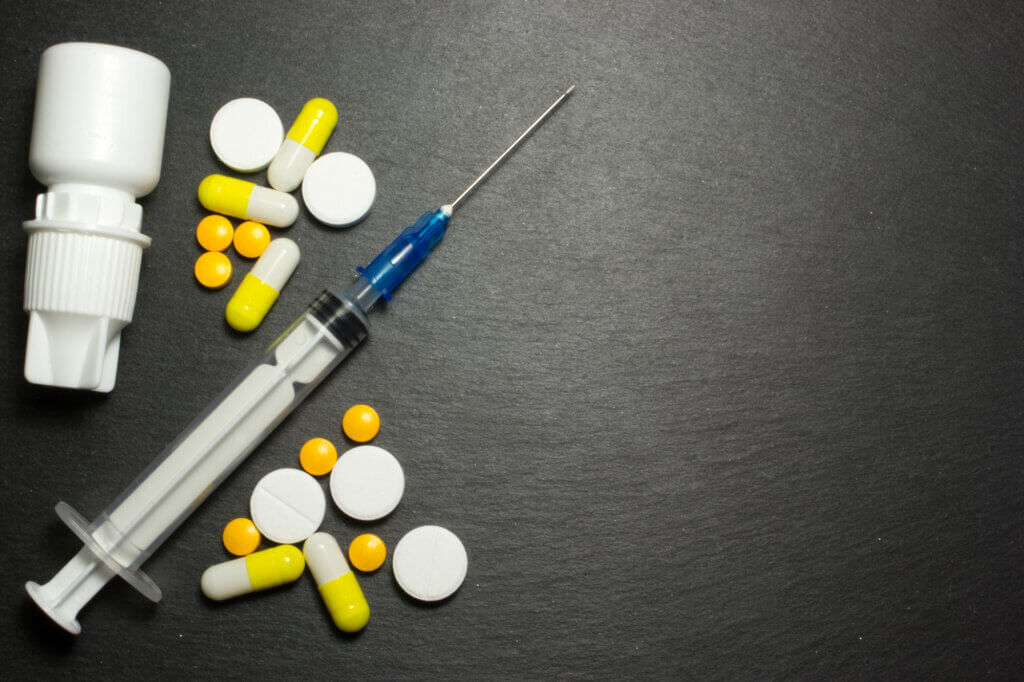 Medical syringe and pills