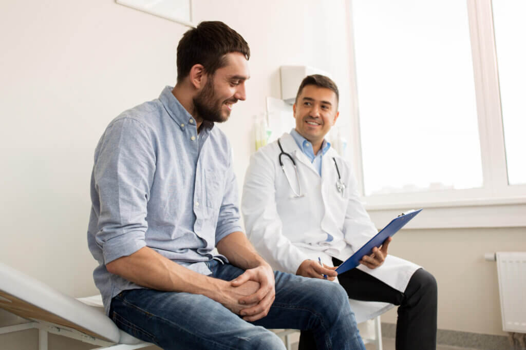 Smiling Doctor With Clipboard